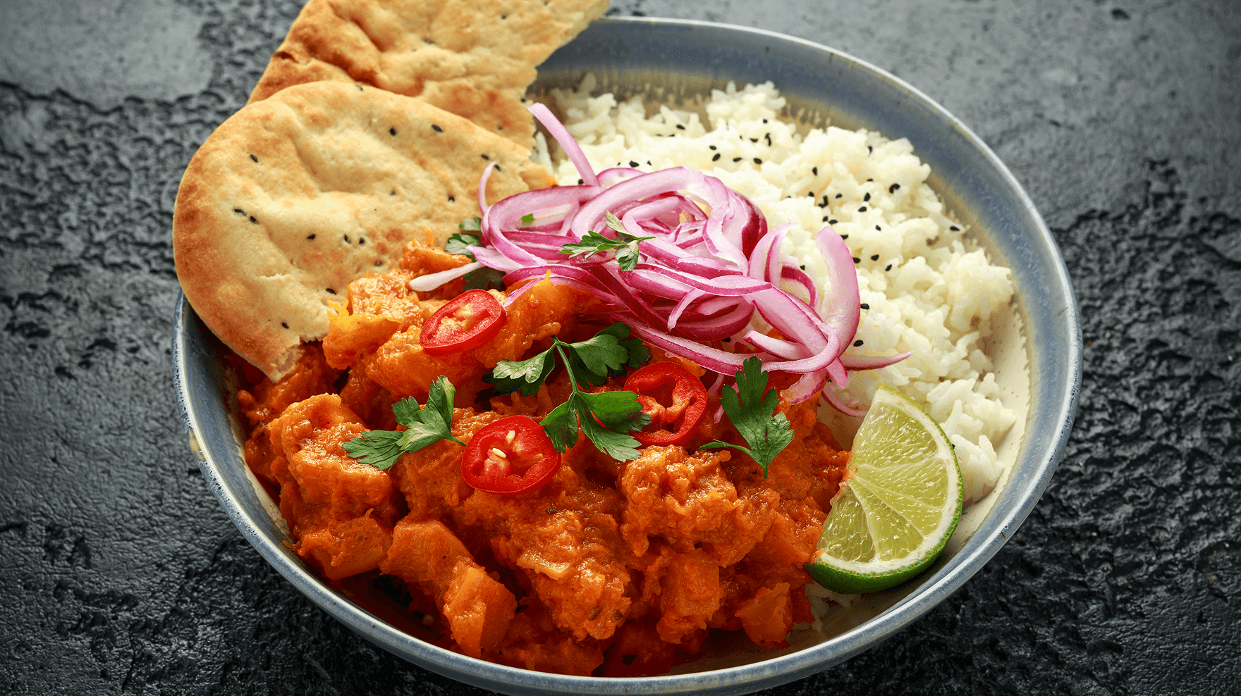 A dish showing a butternut squash curry