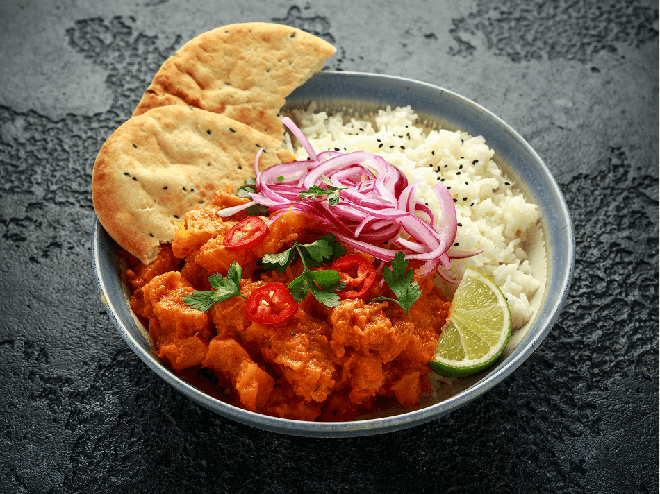A dish showing a butternut squash curry